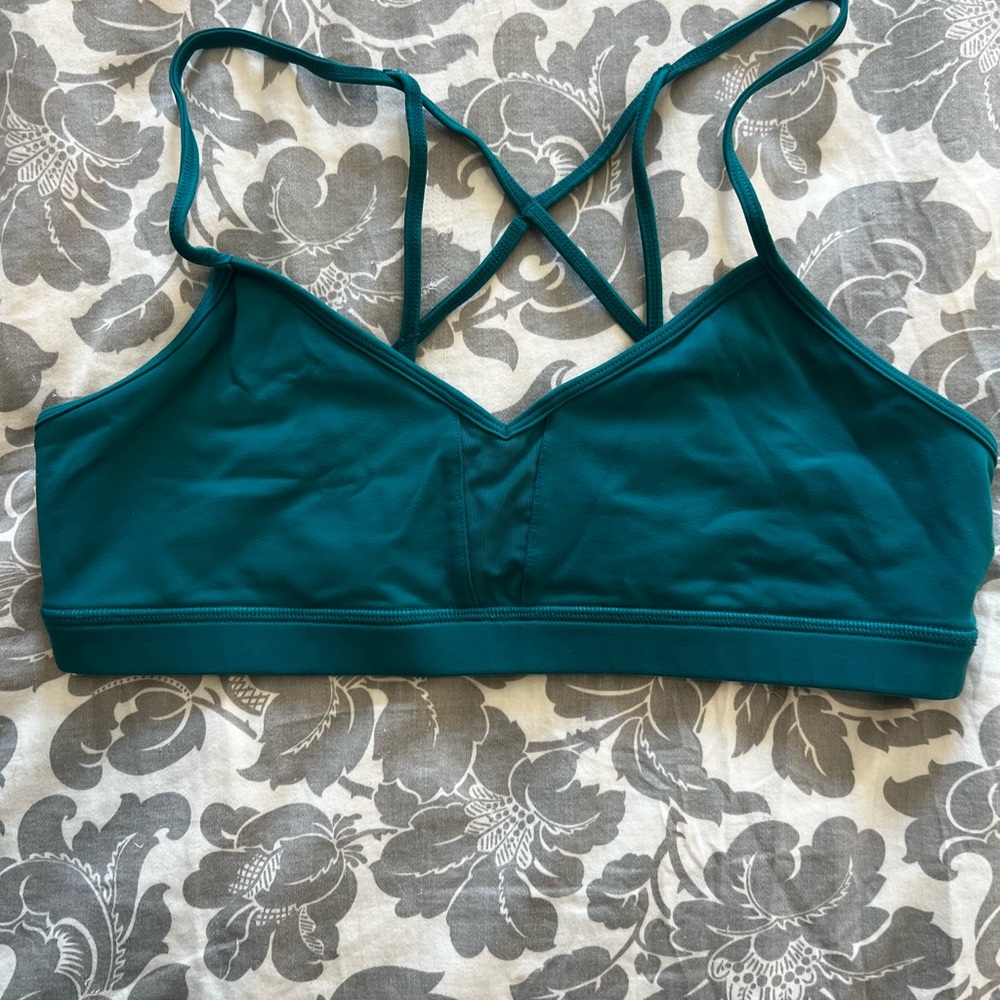 Teal Alo sports bra with mesh center